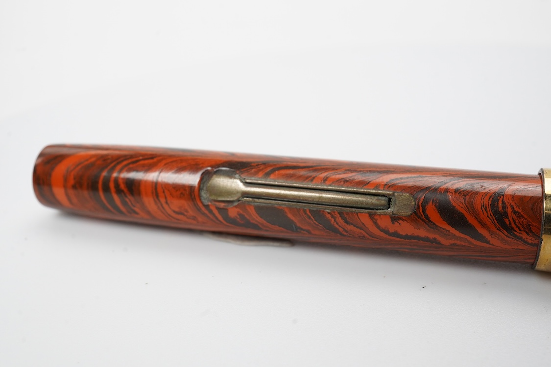 A Waterman Red Ripple No. 5 lever filler with red cap band and fitted with Waterman nib